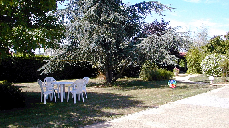 Main Garden in Front of Gites with Seating Area - Click for bigger image in new window