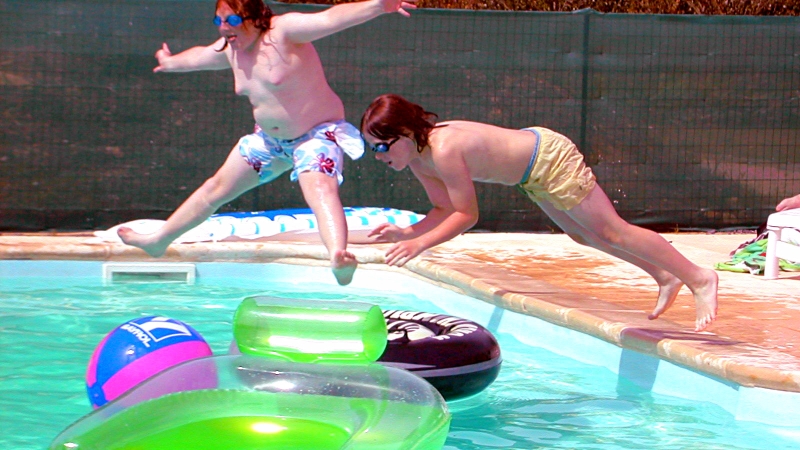 Marc and Rhys in the Solar Heated Pool - Click for bigger image in new window
