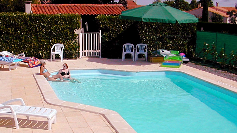 Solar Heated Pool behind Summer Kitchen